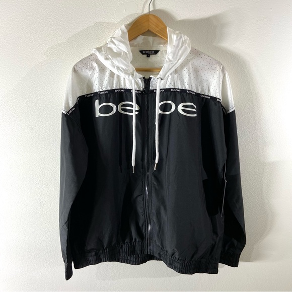 bebe Jackets & Blazers - New bebe sport Windbreaker. Black/White. Full Zip with Hood. Size Large.